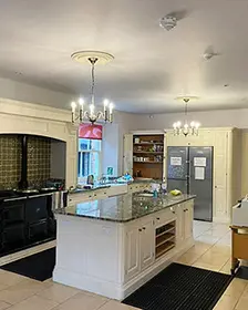 Large operational kitchen with multiple appliances